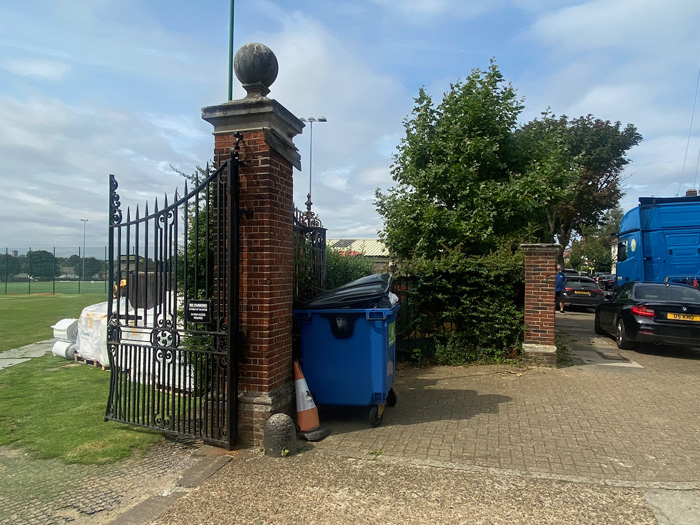 Fig. 34: The Gates at railings along Fieldview, marred by bins