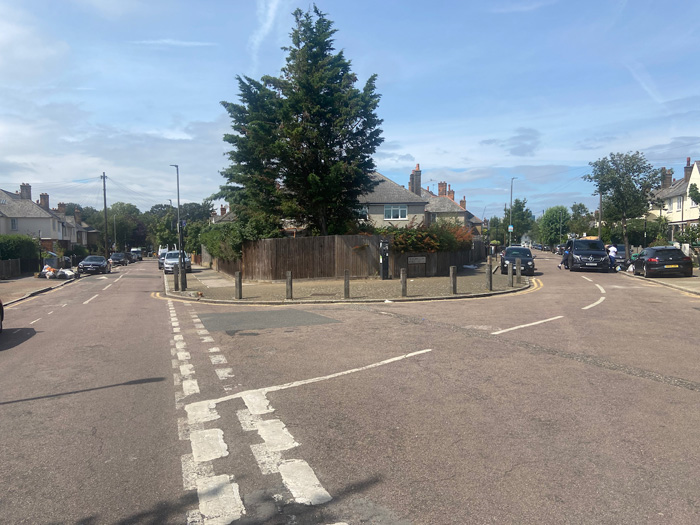 Fig. 46: Paired semi-detached pair with front gardens on a corner, now with high fences giving them the character of back gardens