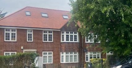 Fig. 63: These rooflights are thoughtfully placed to match the fenestration pattern below and are in scale with the roof. Any more than this and the roof would look cluttered. Many houses would not be suited to have any more than one or two small rooflights.