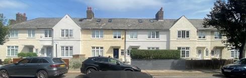 Fig. 74: This terrace has simpler porches but projecting gabled bays add visual interest. Below: Hipped projecting bay and square arched porches.