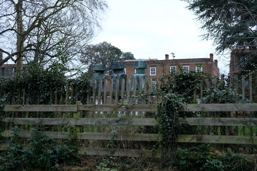 Fig. 105: The Watchers sculpture, barely visible behind the fencing