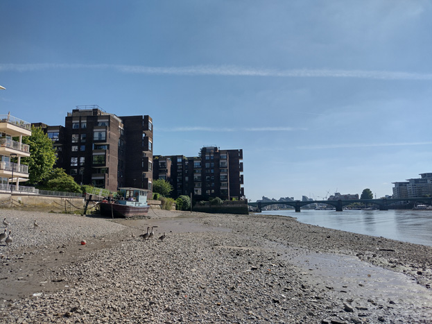 Fig: 70: View from the riverbank with flat development showing character of the river frontage.