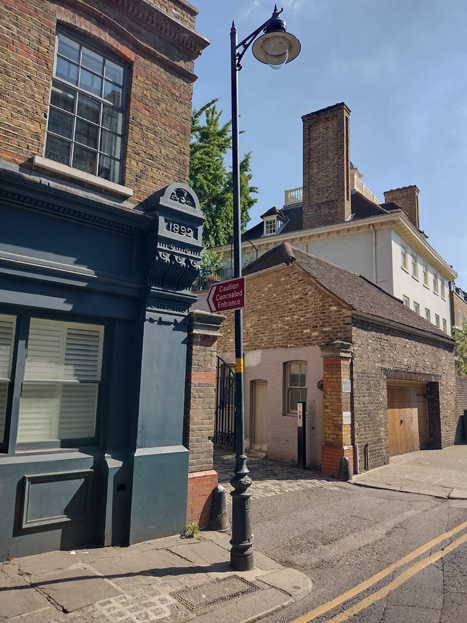 Figs: 99 & 100: There are two styles of ornate lampposts found in the Square