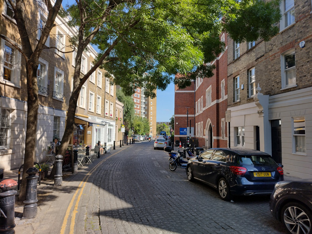 Fig: 71: View south from the Square towards Battersea High Street. The sense of enclosure is mitigated by the slight curve and sky visible beyond