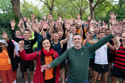 Cllrs Gasser and Hogg celebrate parkrun with a crowd of happy runners