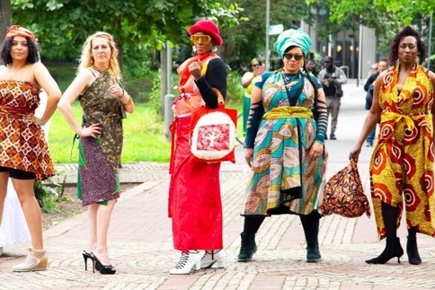 Women posing in various outfits.