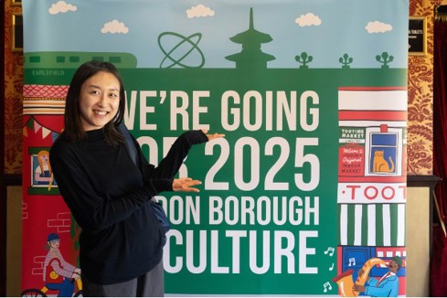 London Borough of Culture banner and person pointing